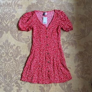 Red sundress. White floral pattern. NEVER WORN.